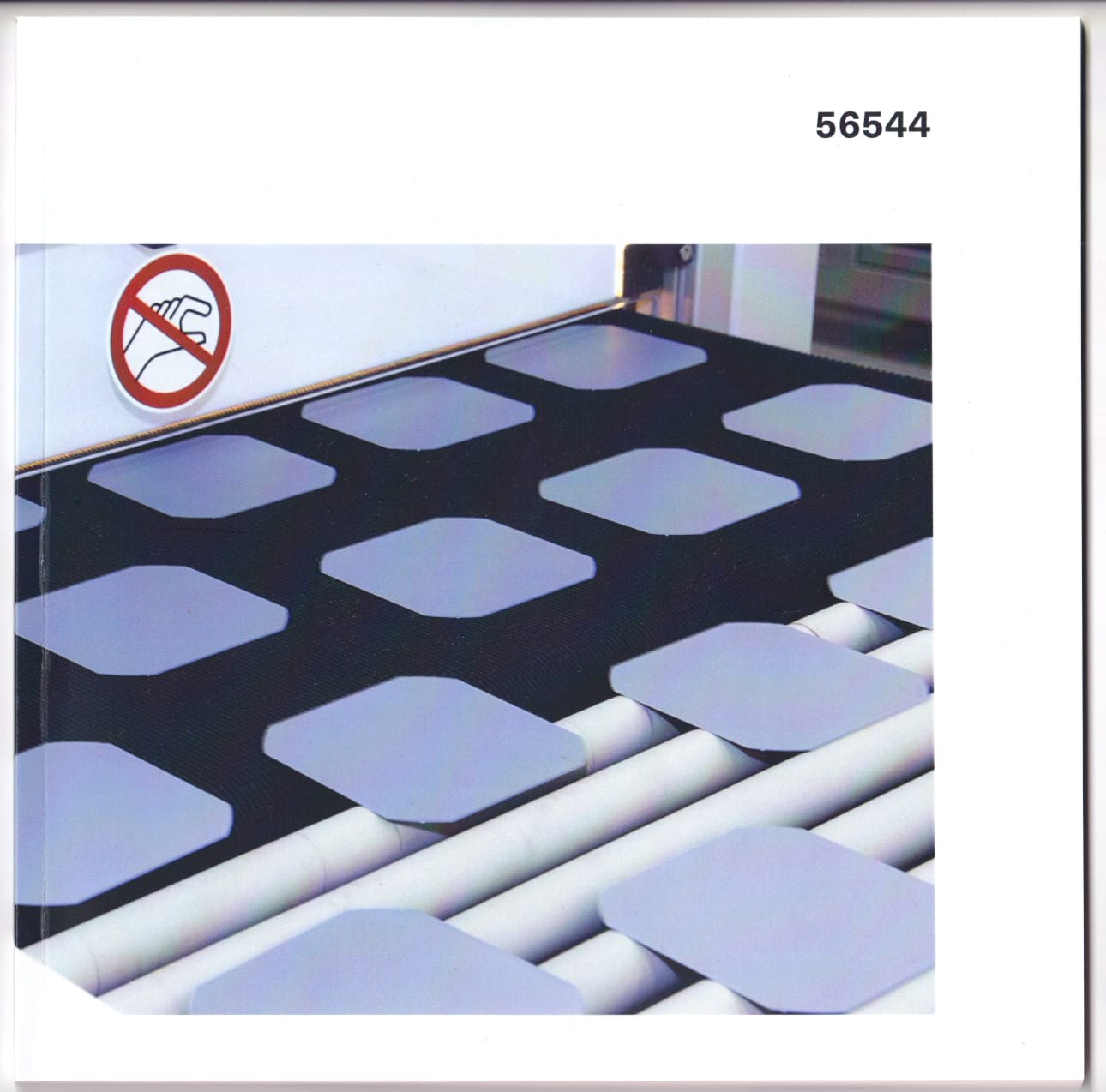 TThe cover of the print version of the text, showing a commons image of wafers on a conveyor belt.